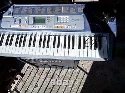 Key board 100 watt amp. Keyboard. And microphone + power supply